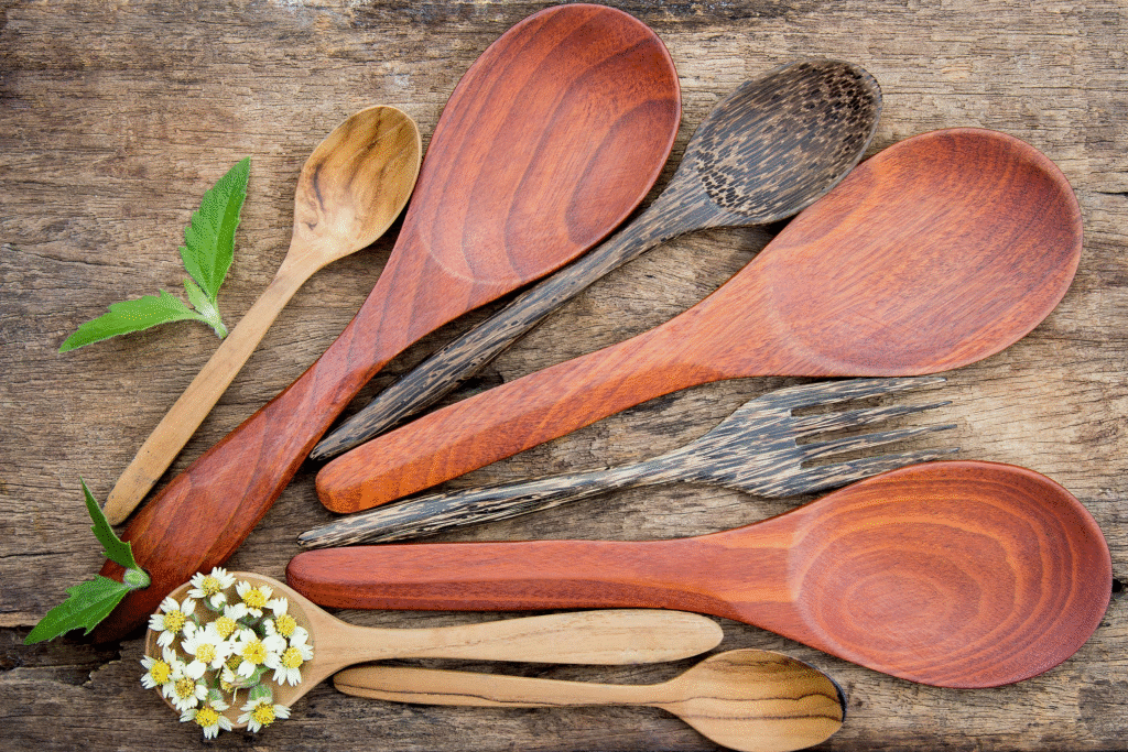 Multiple wooden spoons of different colours