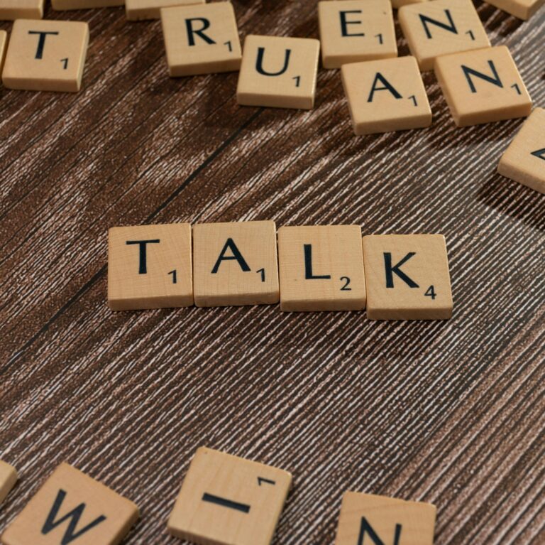 Talk spelled out with Scrabble pieces