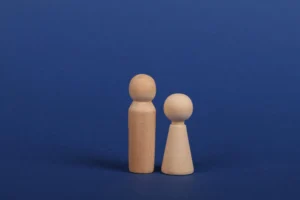 Affordable Counselling Network - Online Therapy UK - Services - Two Wooden Dolls Together